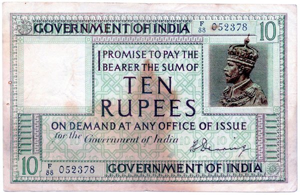 INDIA. George V: 10-Rupees Green 1917-30 s/n. F/88 0523: INDIA. George V: 10-Rupees Green 1917-30 s/n. F/88 052378 (P.6). Usual staple holes, stains, original EF