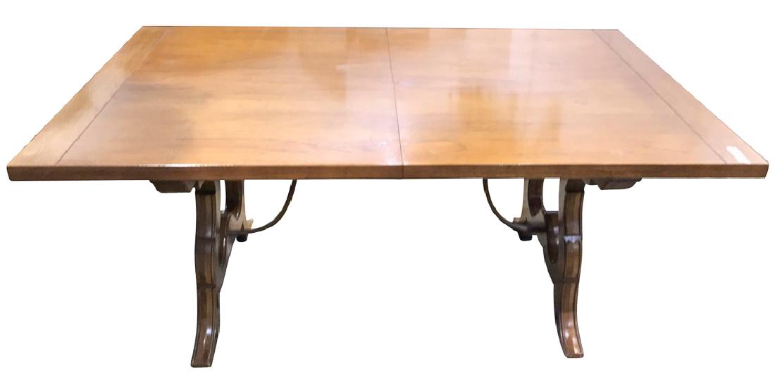 Spanish Style Blonde Pecan Wood Table, With: iron stretcher and two leaves, 42 inches wide by 68 inches long by 29 inches tall, good condition
