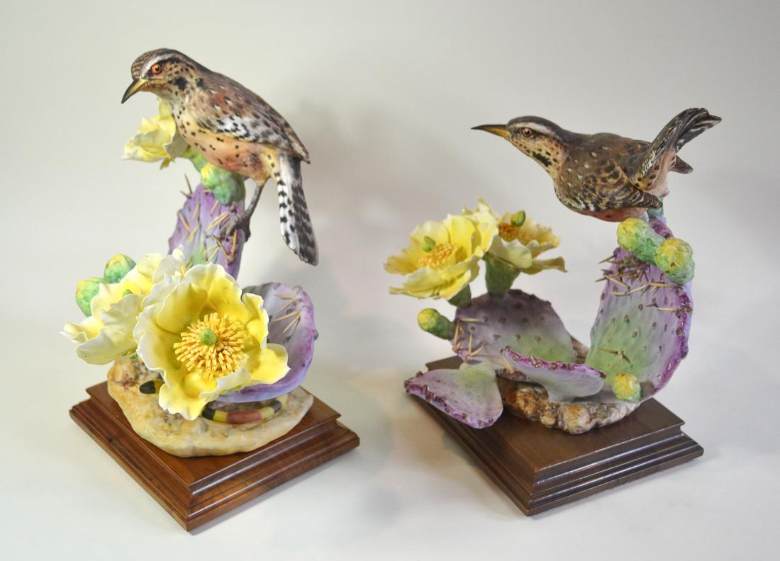 ROYAL WORCESTER CACTUS WRENS, PAIR: English Fine Bone China, Decorated. Limited Edition, hand painted with authentic hallmark. Shape number: 3618 & 3619. The Male is perched with uplifted tail on a catus plant. A desert snake concealed 