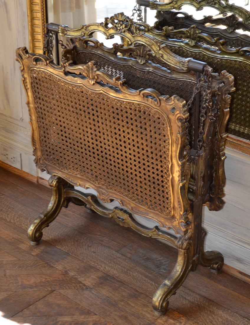 French Giltwood Canterbury.: Or Magazine Rack With Caned Panels. Trestle Base With Carved Stretcher. 30H X 23W X 11.5D.