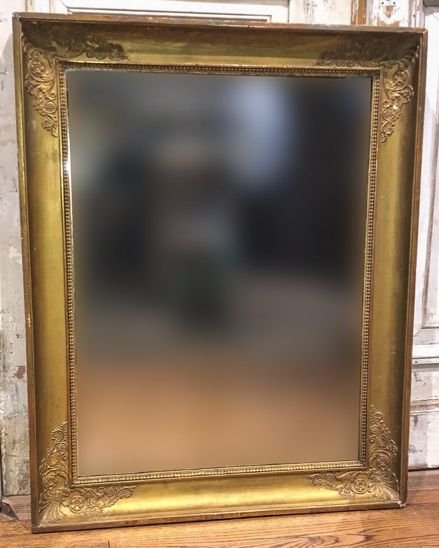 19th Century French Gilt Mirror.: The Corners Carved In Relief With Foliate Scrolls And Flowers. Good Antique Condition. Some Gilt Loss. 32 X 41.