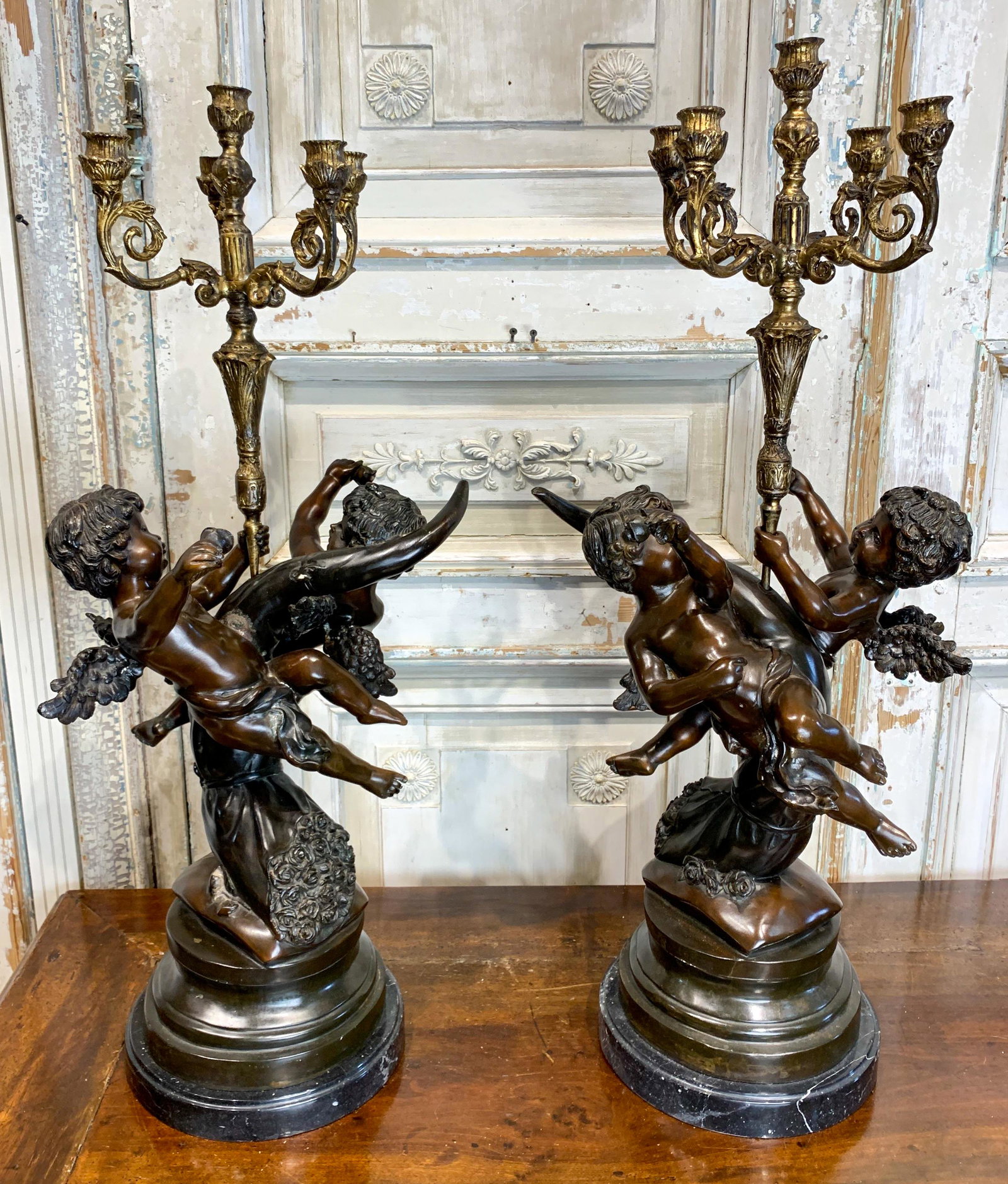 Large Pair Of Bronze Putti Candelabra: Set On Marble Bases; 20th C. 33 H X 14 W