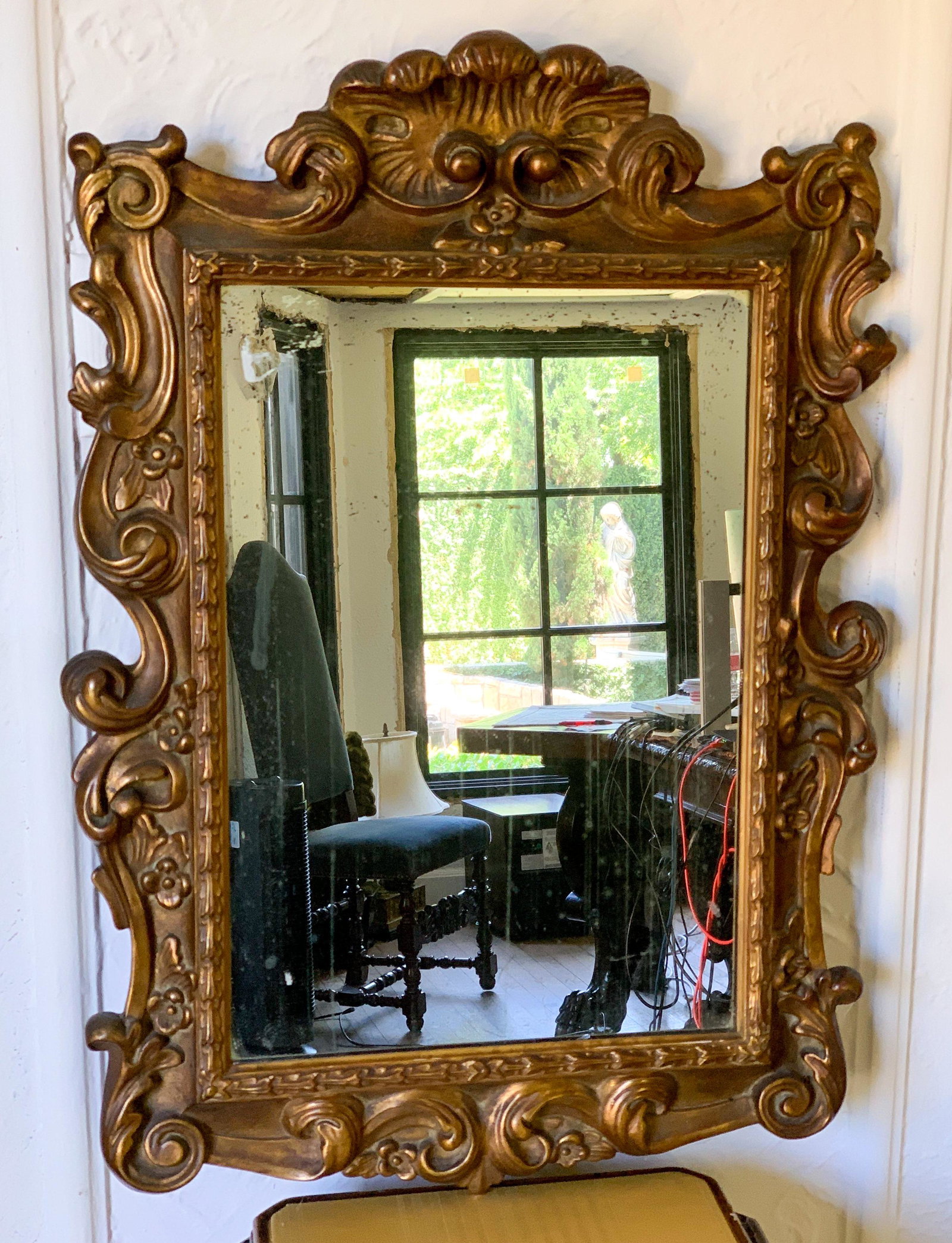 An Italian Baroque Gilt Wood Looking Glass: Early 20th Century Mirror. 29.75h X 21.5w X 2d
