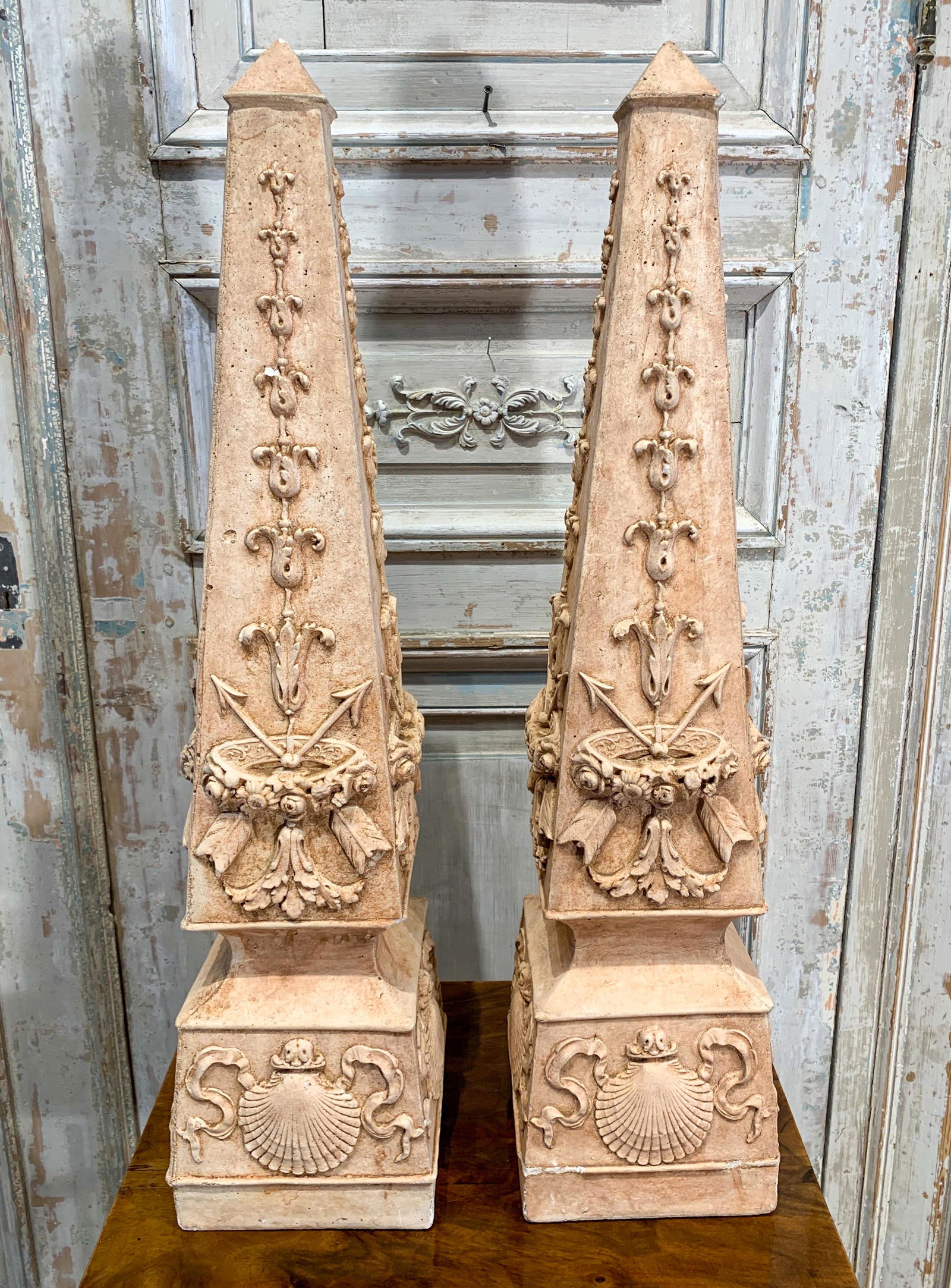 Pair Of Cast Stone Relief Sculpted Obelisks: Good Condition, Slight Chipping , 32 High Base Is 7.5 X7.5