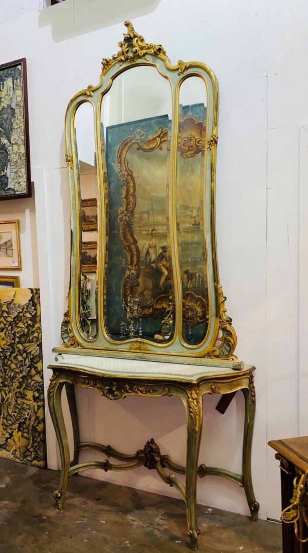 Italian vanity table and mirror: Painted a soothing green with gilt highlights 19c, very good condition. 112h x 53w x 21d. Mirror is ready to hang and rests on the console.