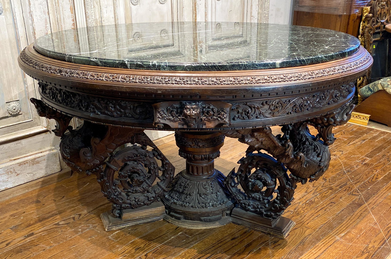 Massive Heavily Carved Continental Center Table: fine winged carvings And Verde Marble Top, c. 1870 59x34