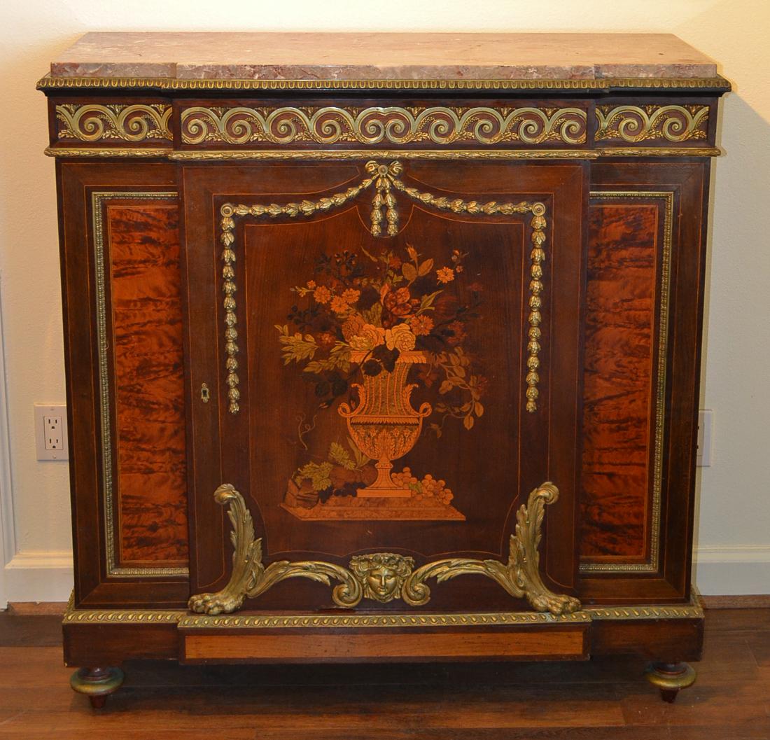 French Belle Epoque Parlor Cabinet: Having A Highly Figured Marble Top Over Gilt Bronze & Intricate Floral Inlays Accented With Ormolu Swags; Circa 1900. Excellent Antique Condition. 43.25h X 43w X 16d.