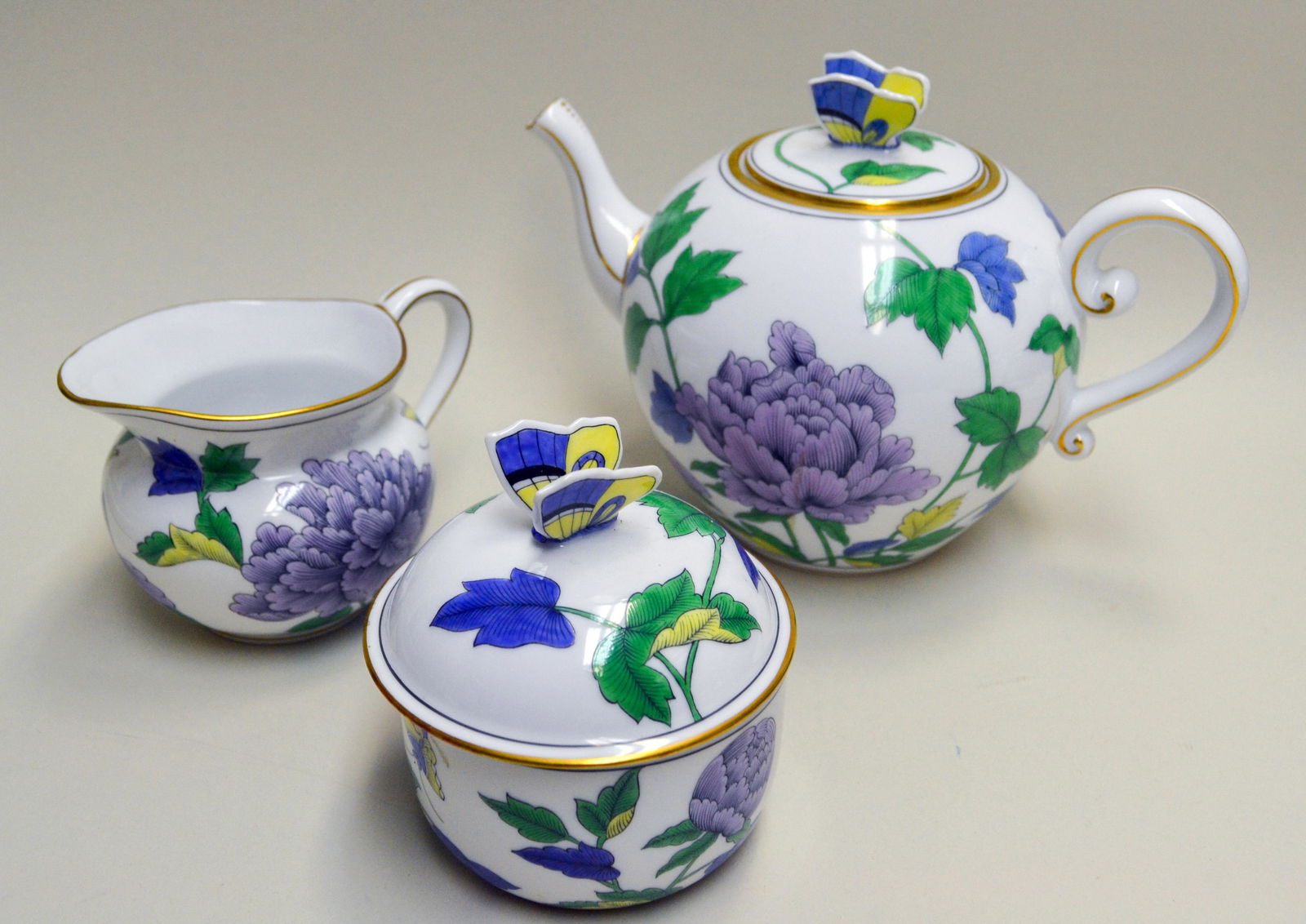 Herend Porcelain Tea Pot Set: Signed By The Artist Matumek Jamas At One Of The Trunk Shows In Palm Beach, Fl. Herend Studios - Hungary. Closed Edition. 2002. Tea Pot, Sugar And Creamer With Butterflies. Markings: 2463.2.00/pvfp 5.