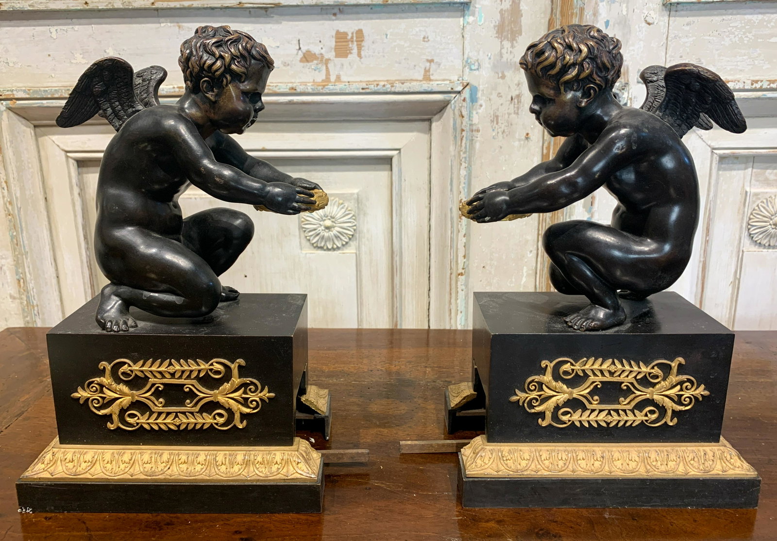 Good Pr. Of French Regence Bronze Andirons: With Dark Patina And Gilt Bronze Highlights, Winged Putti Surmounts, C. 1860 12 H X 5 D X 8 W