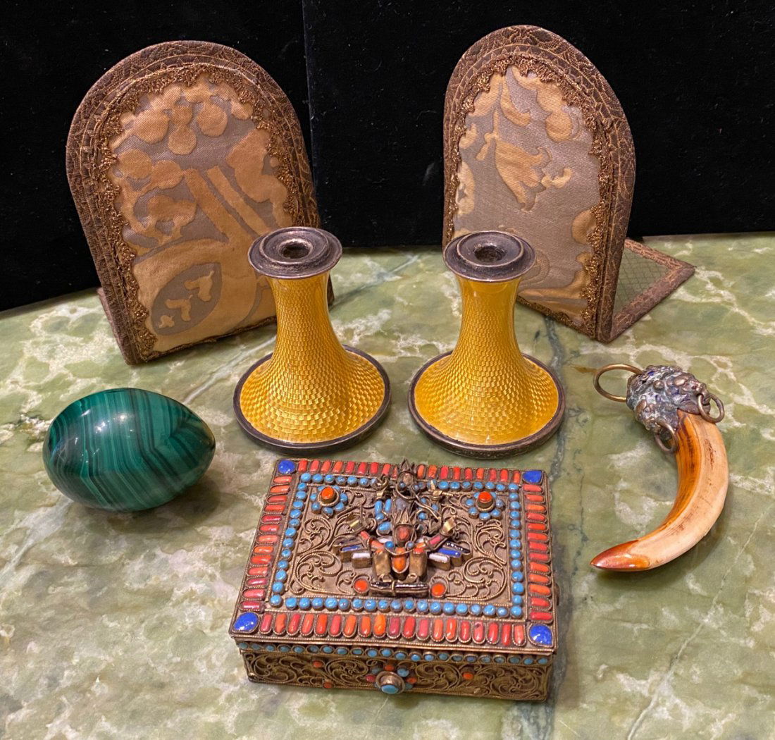 7 pc Collector's Lot: including tribal ornament, malachite egg, yellow enameled candlesticks, antique bookends, and old souvenirs box.