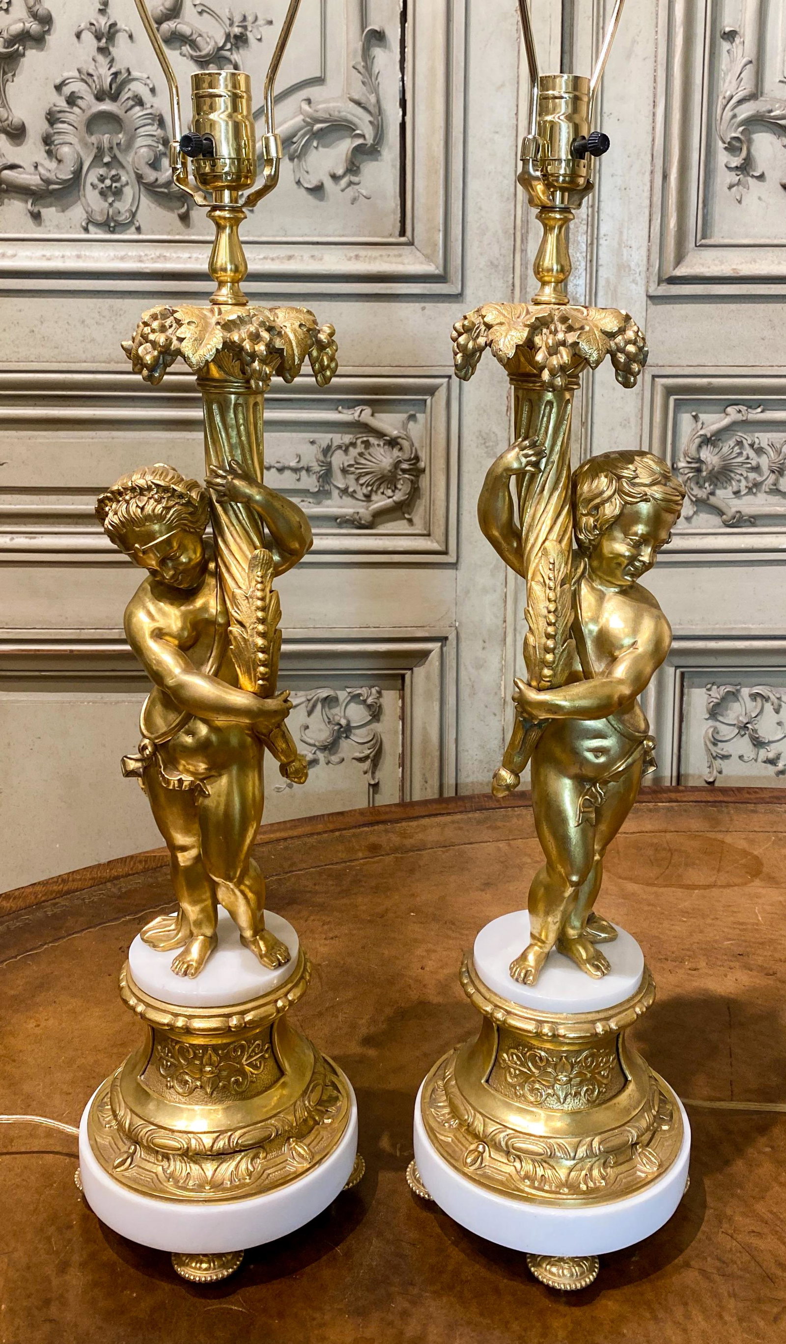 Pair of French Gilt-bronze And Marble Lamps: Figural Lamps With Recent Wiring. 8x35 To Top Of Harp, Good Condition. Likely early 20c.