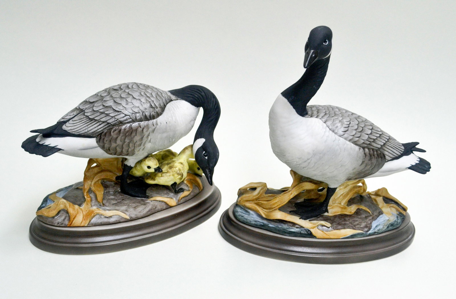 Boehm Porcelain Canada Geese, Pair: Hand Created, Hand Painted By Ed Boehm. Issued: 1953. Closed Edition. Hallmark: 408. Signed Boehm In Script. Porcelain Bases. 7 1/2"h X 7 1/2"w X 4d