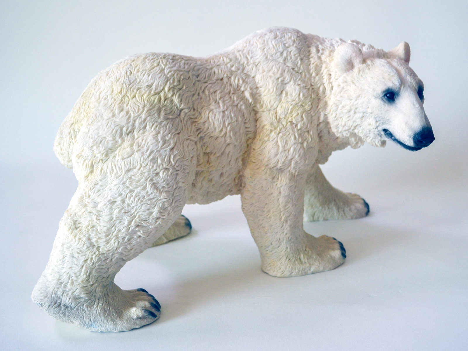 Polar Bear, Standing: A fine detailed figurine of a Polar Bear, decorated resin. Vintage, issued: 1970's. 11"H X 20"W X 10"D