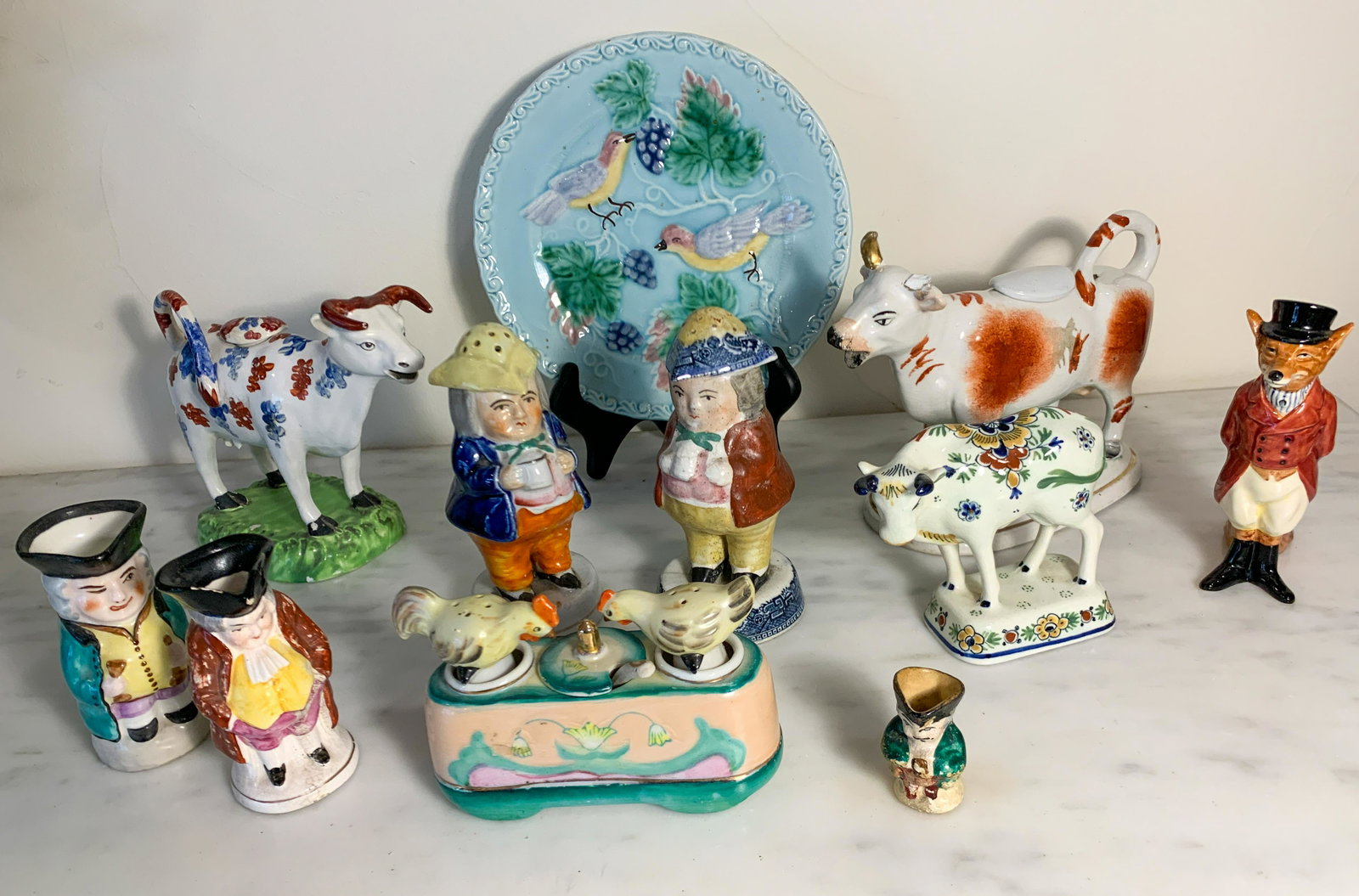 11 Pc Lot Of Staffordshire, Doulton Fox, Etc.: English Toby Jugs, Majolica Plate One Cow Horn Missing