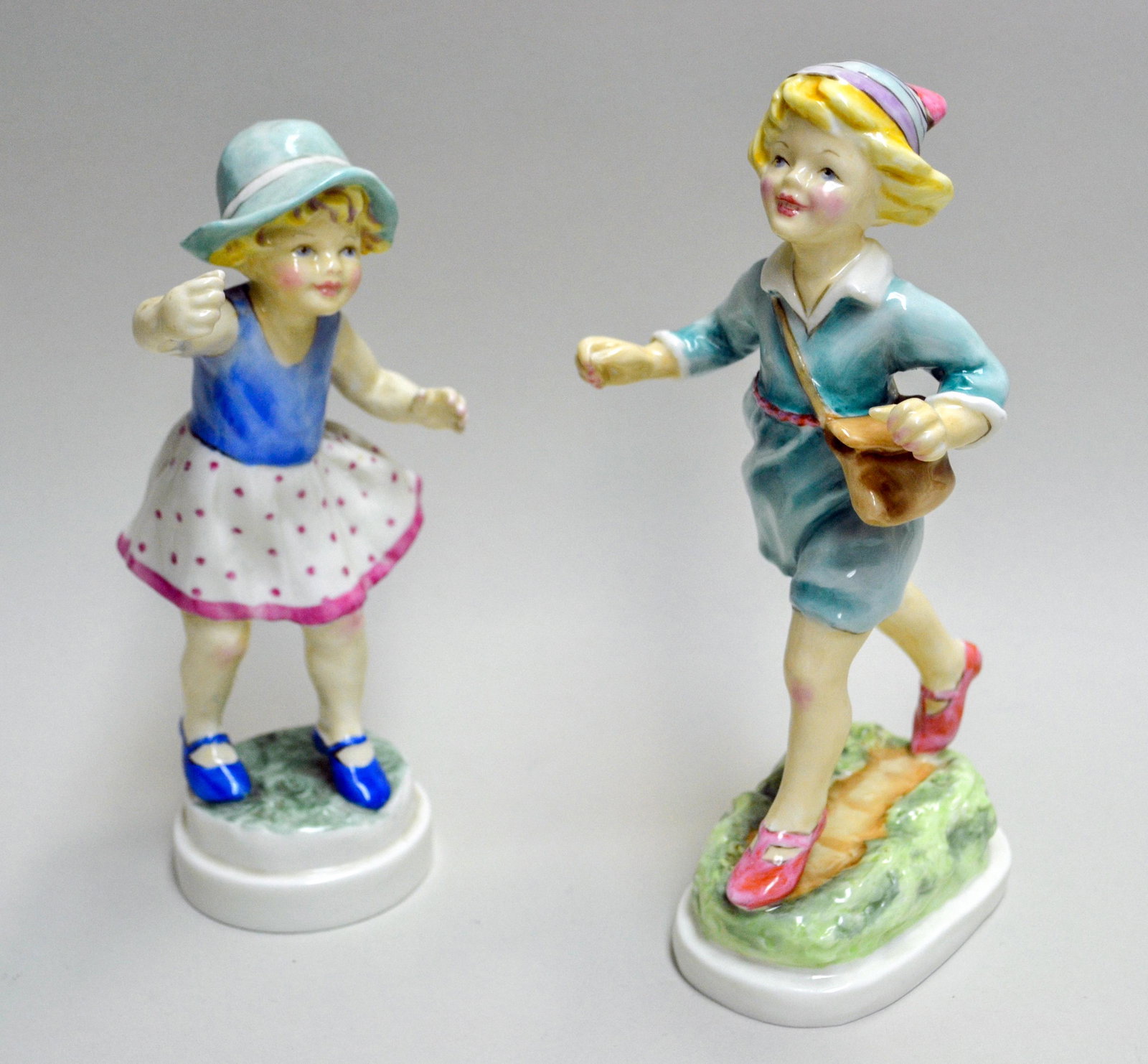 Royal Worcester Sunday & Thursday's Children: English Fine Bone China, Decorated Figures. Modeled By F.g. Doughty. Hand Created, Hand Painted. Models: 3518 & 3522. 7"h & 7.5"h