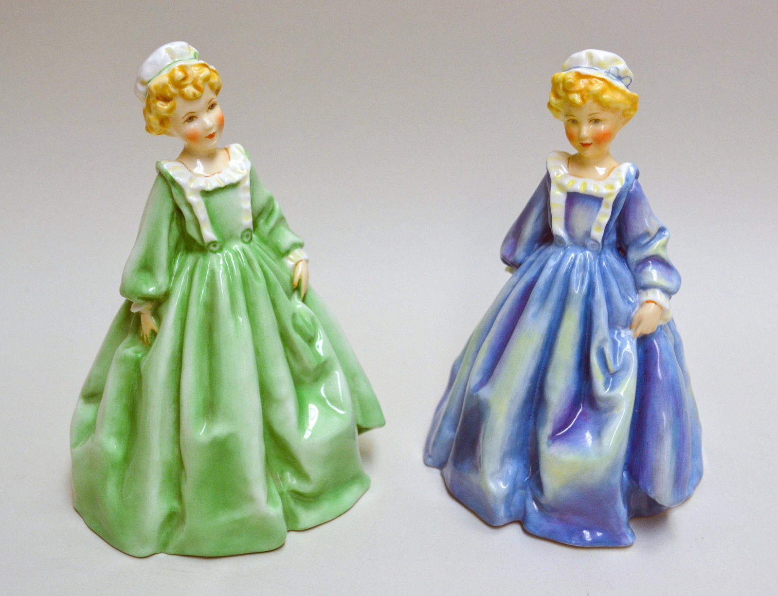 Royal Worcester F.g. Doughty Grandmothers Dress: English Fine Bone China, Decorated In Blue And Green, Children Figurines. Hand Created, Hand Painted. Models: 3081 & 3081. 7"h & 7"h