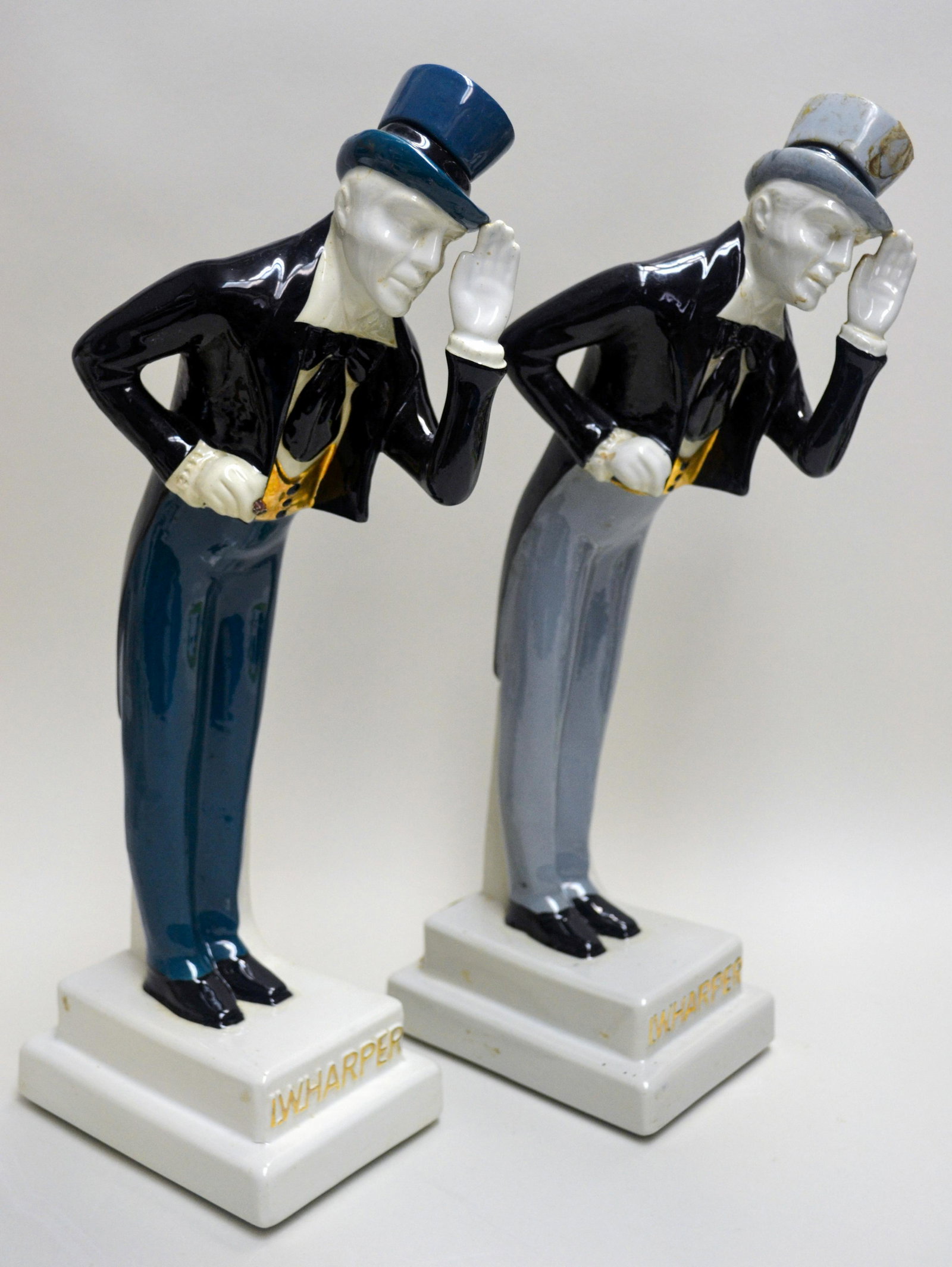 I. W. Harper Porcelain Decanters, 1955: Featuring A Pair Of Gentlemen, Empty. Originally Filled With 150 Month Old Kentucky Bourbon, 4/5 Pint, 1969. Original Seals, Hallmarked On The Bottom. 16"h X 4"w X 8