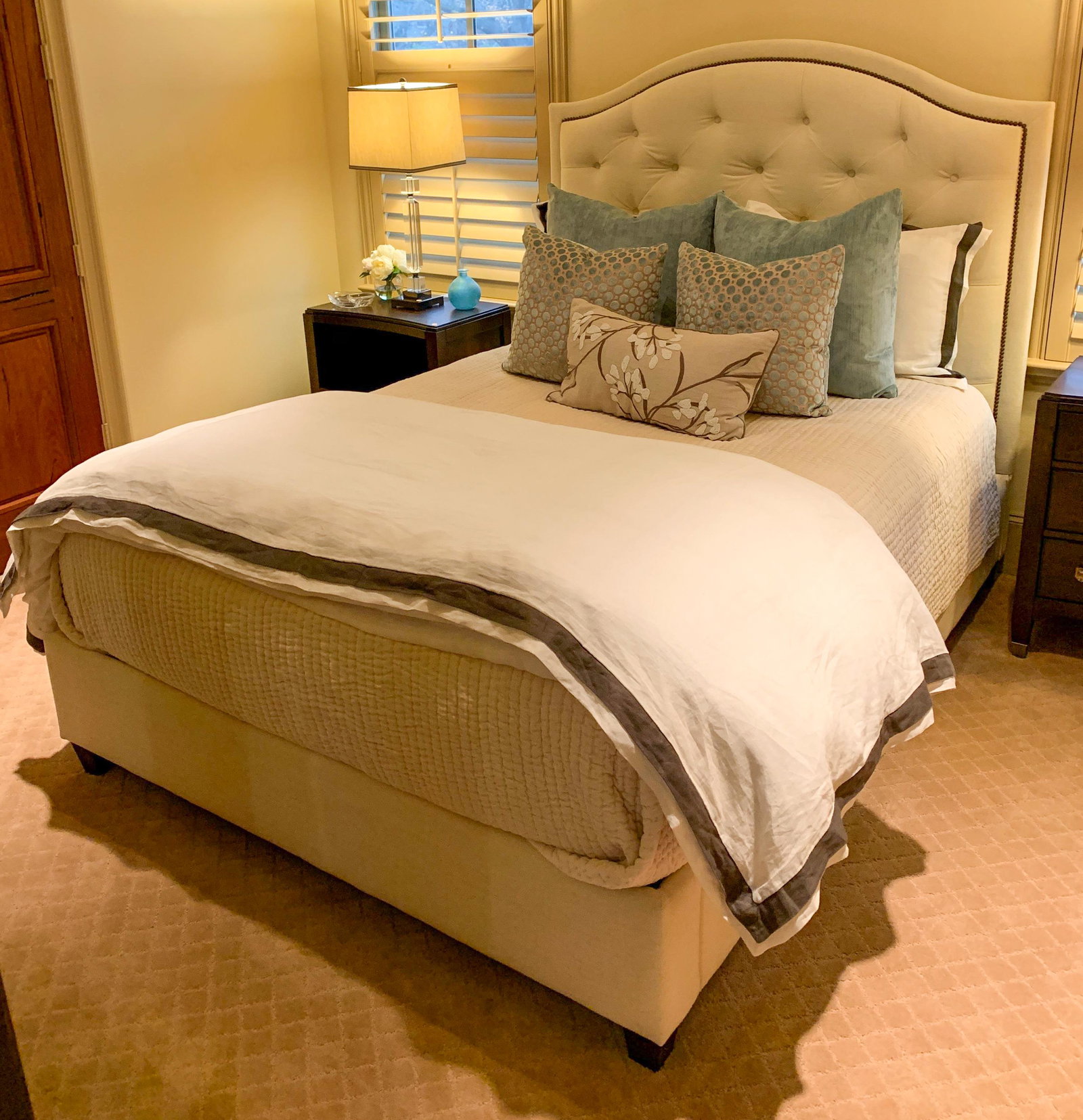 Upholstered Queen Bed: 63h X 61w X 85l. As New Condition.