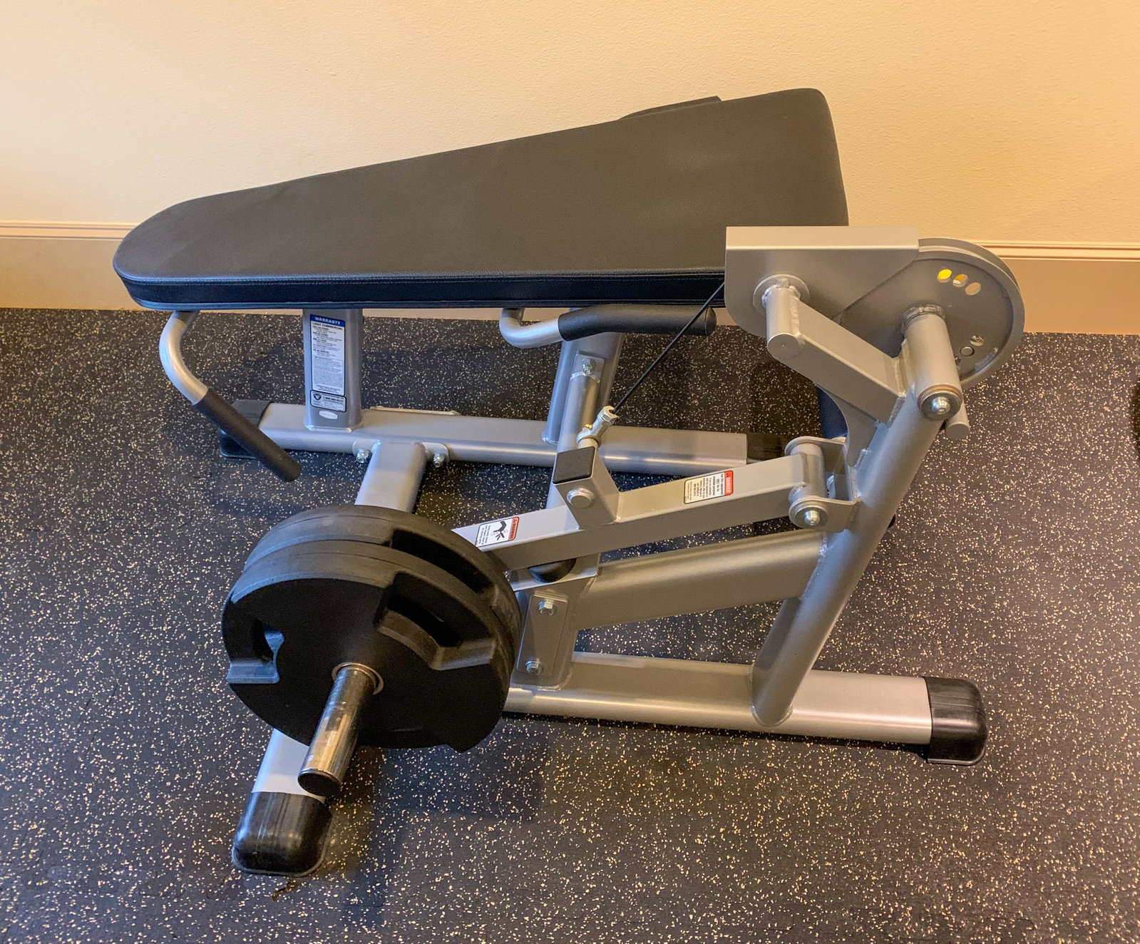 Tuffstuff Leg Curl Bench: And Plate Load Extension. Like New. Includes Weights Pictured.