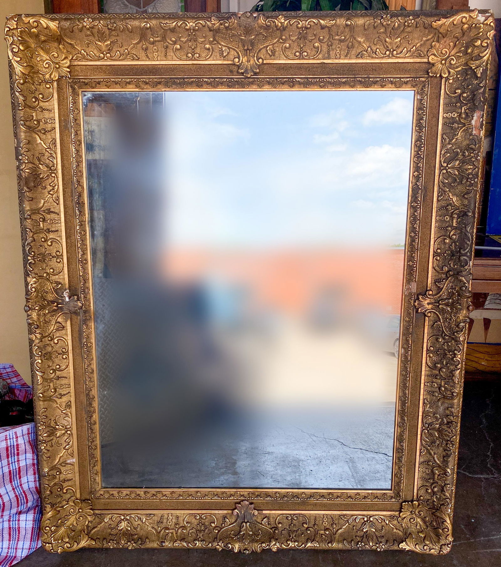 A Large 19th C. English Gilt Wood Mirror: C. 1870. 61x50. See photos for significant loss to frame.