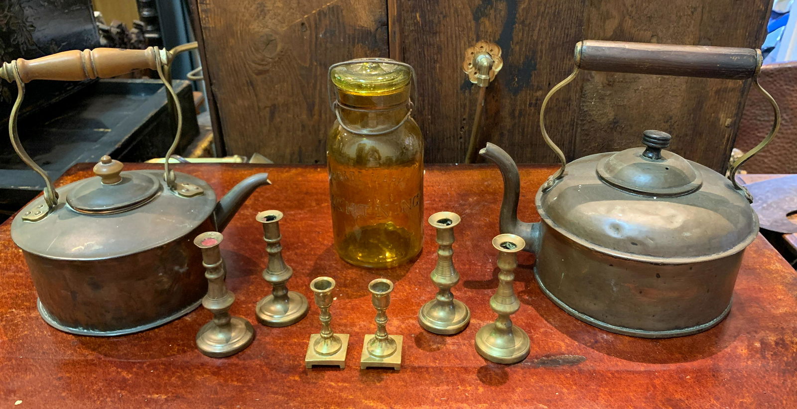 Whimsical Lot Of Miniature Candlesticks: English antique pieces and a rare amber Lightning fruit jar and 2 antique English copper tea pots