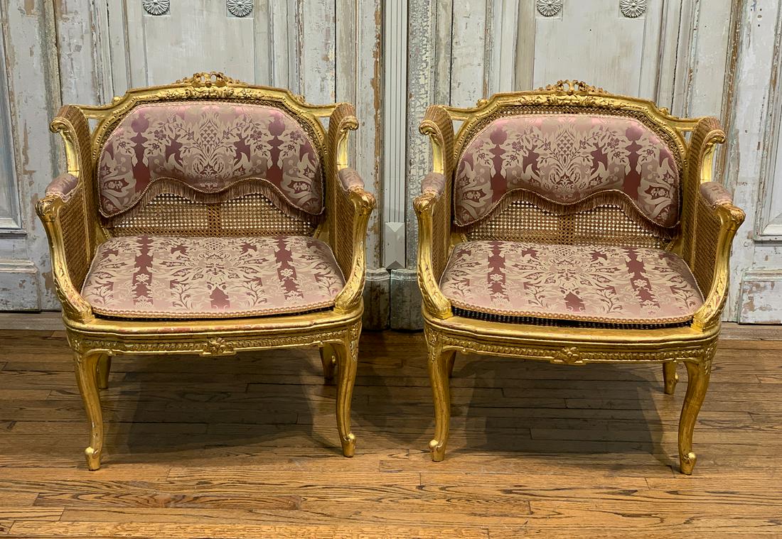 Fabulous Pair Of French Giltwood Bergeres: 19th Century Carved And Caned Marquises With Superb Custom Upholstery. Each Armchair 30w X 32h X 24d. See Photos For One Area Of Caning Needing Repair.
