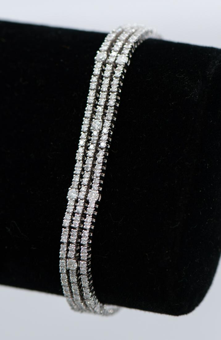 14k Three Row Diamond Bracelet: 4.47 Ct. Total Weight Of Diamonds. Total Weight Of Bracelet 17.70 Gm. See Photos For Certified Appraisal. Estimated Retail - $14,000.00