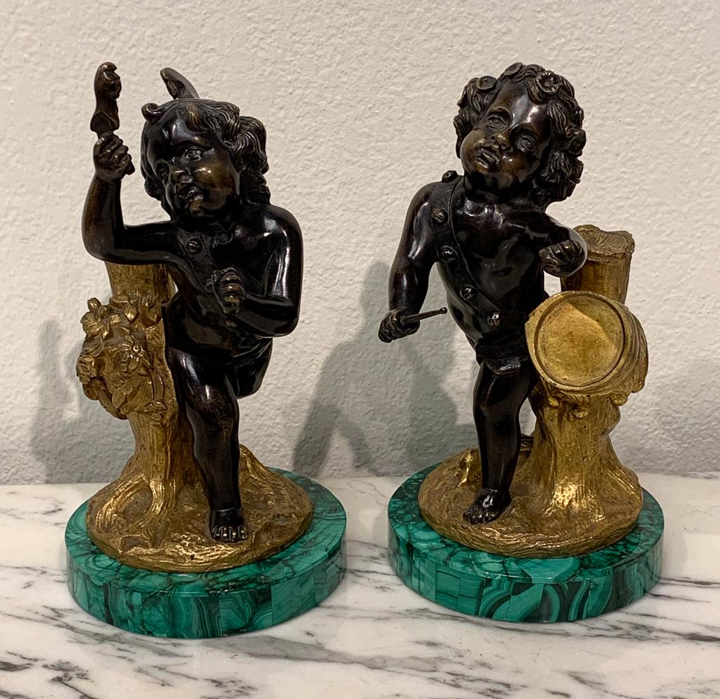 19th Century Pair Of Bronze Putti On Malachite: Parcel Gilt On Malachite Bases. Each 8.5h X 4.5w X 6d. Very Good Condition As Shown In Photos.