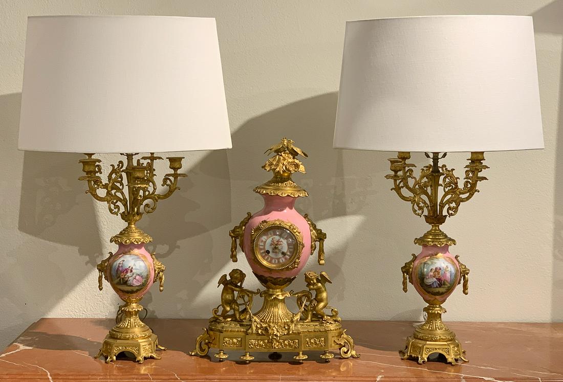 Pink Ground Sevres Style Garniture: Candelabra Have Been Wired As Lamps, Working Condition Unknown, Wiring Is Vintage And Not Guaranteed. Clock Is 16x5.5x21; No Key. See Included Provenance Document. 20 Inches To Top Of Candelabra; To T