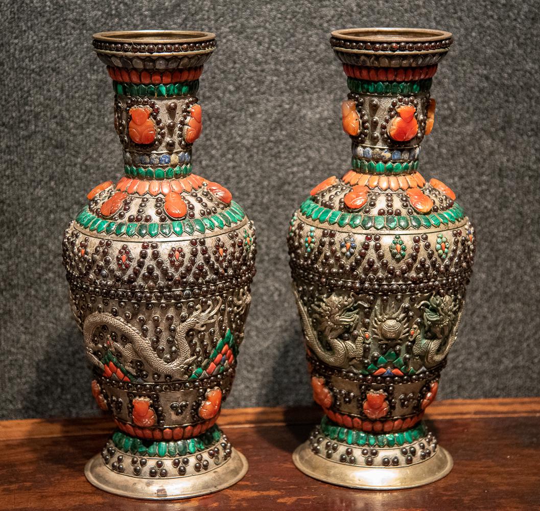 Pair Of Silvered-copper Bejeweled Vases: Mounted With Turquoise, Coral, Lapis Lazuli, Carnelian, And Malachite. Typical Patina For Age. Some Smaller Stones Missing Or Cracked, See Photos For Typical Tarnish. 18 X 8. 41524