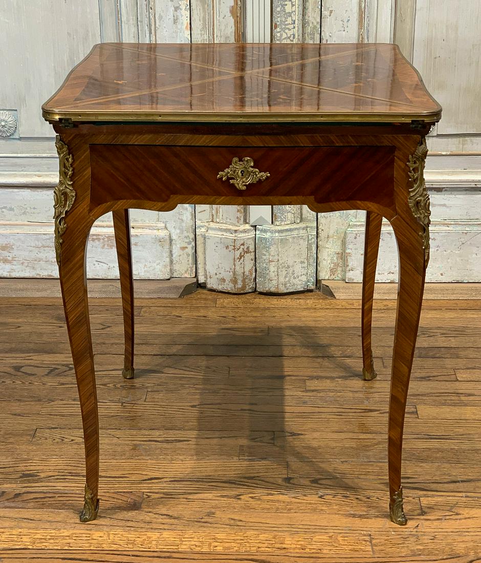 Antique French Envelope Folding Game Table: With Marquetry Inlays And Green Felt Surface. Closed 29.5h X 24w X 24d. Open 32.75w X 32.75d.