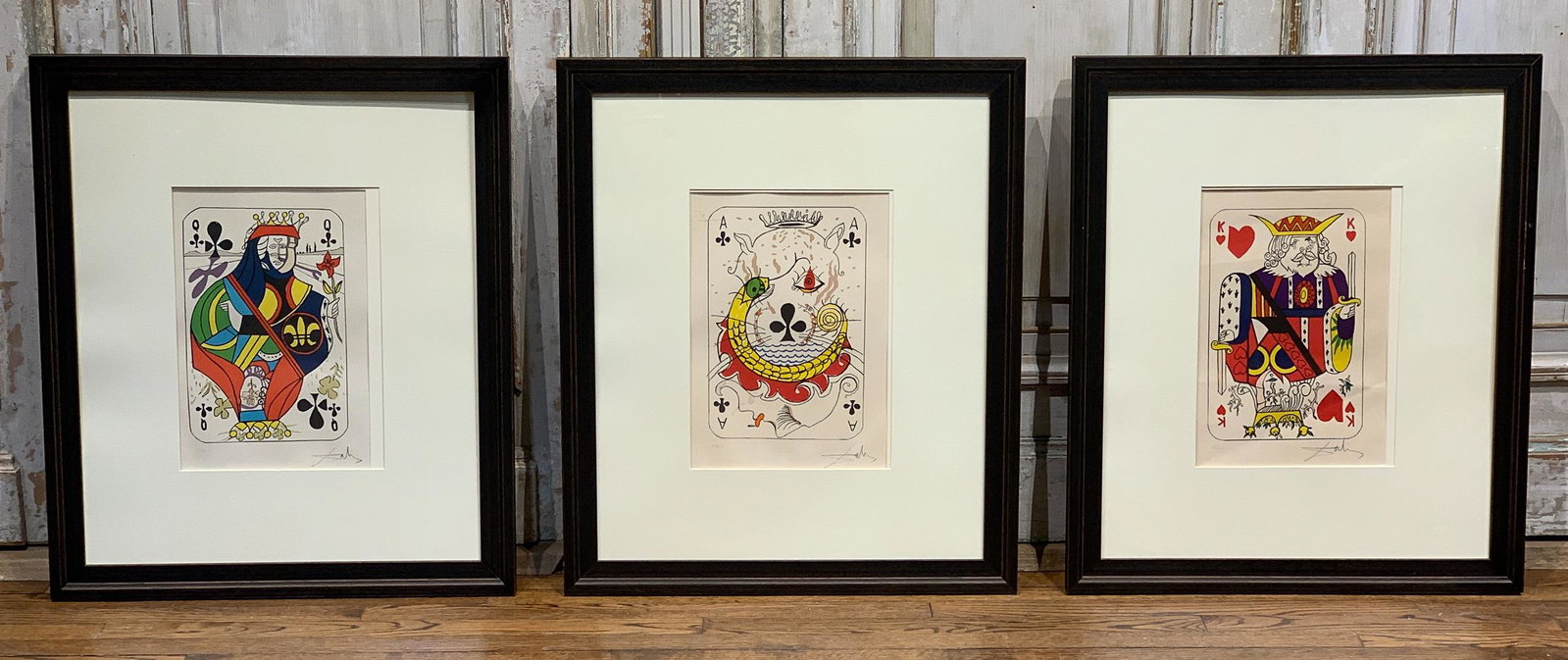 3 Dali Lithographs From The Playing Cards Suite: Includes Queen Of Clubs, King Of Hearts, And Ace Of Clubs, All Signed And Numbered. Queen Of Clubs Referenced On Bruce Hochman Guide 2017, P. 98-99. Images Are 14 X 9 1/4. Framed Works Are 33 X 28 Eac