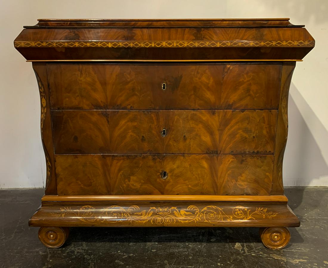 19th C. Austrian Marquetry Inlaid Commode: In Matched Grain Flame Mahogany, Having Unusual Shaped Edges And Circular Feet. Structurally Sound. Wear Commensurate With Age. Minor Repairs To Veneer And Age Cracks On Sides As Shown In Photos. Rece