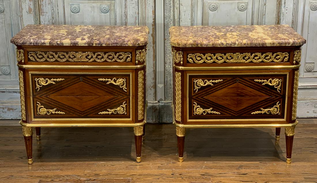 Exceptionally Fine Pair Of French Commodes: Inlaid Commodes With Detailed Cast Gilt Bronze Mounts And Thick Marble Tops. Each 34.5w X 19.5d X 34.5h. 20th Century