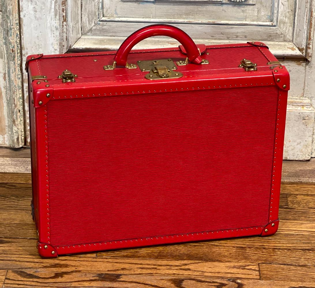 Louis Vuitton Red Epi Leather Case: Rare Louis Vuitton Leather Suitcase With Clochette And Key. Very Infrequent Use. See Photos For Slight Marks, Scuffs, And A Mark Inside (likely Makeup), Otherwise Clean. Notice Corners. Hardware Will 