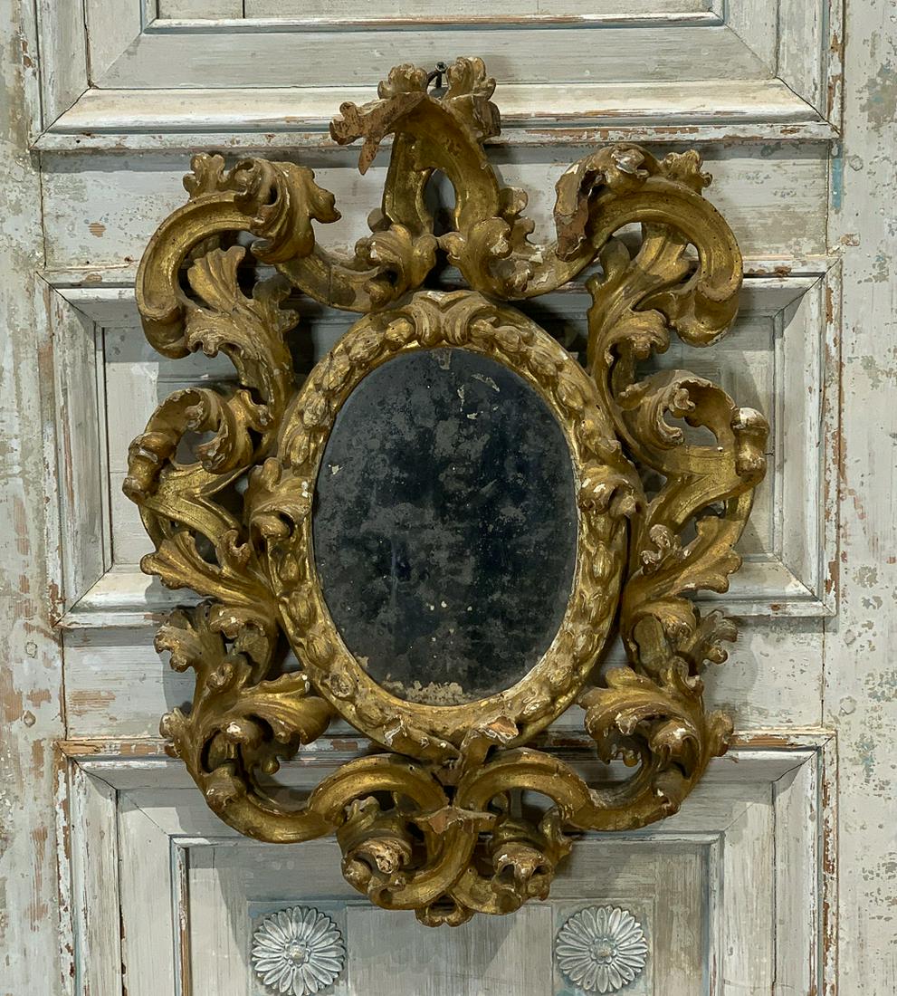 19th Century Italian Carved Giltwood Mirror: Likely Earlier. With Original Mirrored Glass. 25h X 16.5w X 4d. See Photos For Antique Condition and Missing Elements at Cartouche.