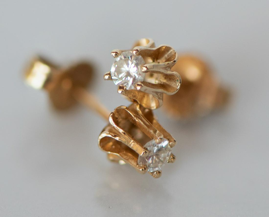 Sweet Pair Of 14k Gold And Diamond Earrings: See attached photos for approximate size.