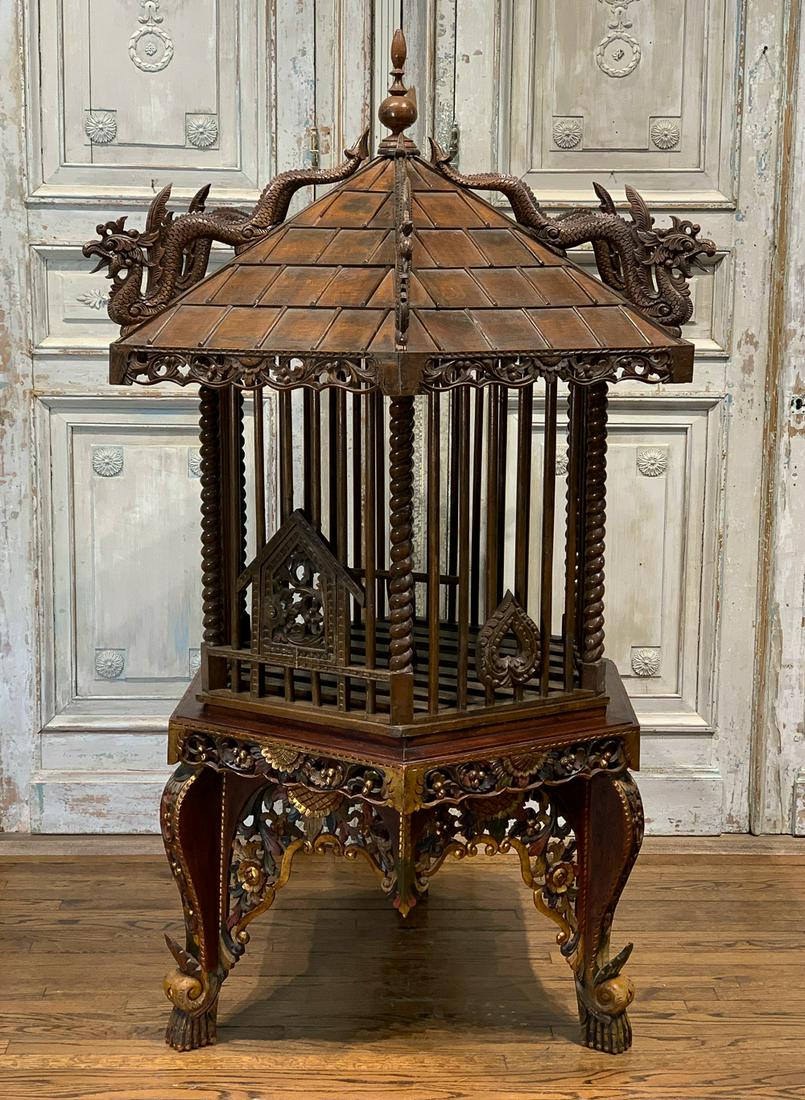 Impressive Large Vintage Indonesian Bird Cage: Carved Wood Pagoda-style Topped With Dragons And Resting On Parcel Gilt Base. 74h X 49w.