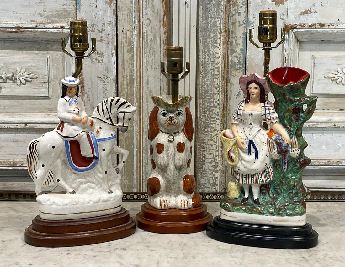 3 Staffordshire Lamps: Tallest Is 17 Inches Overall. Typical Crazing For Age. See Photos For Typical Losses. Working Condition Unknown. Three Shades Included, No Harps Or Finials.