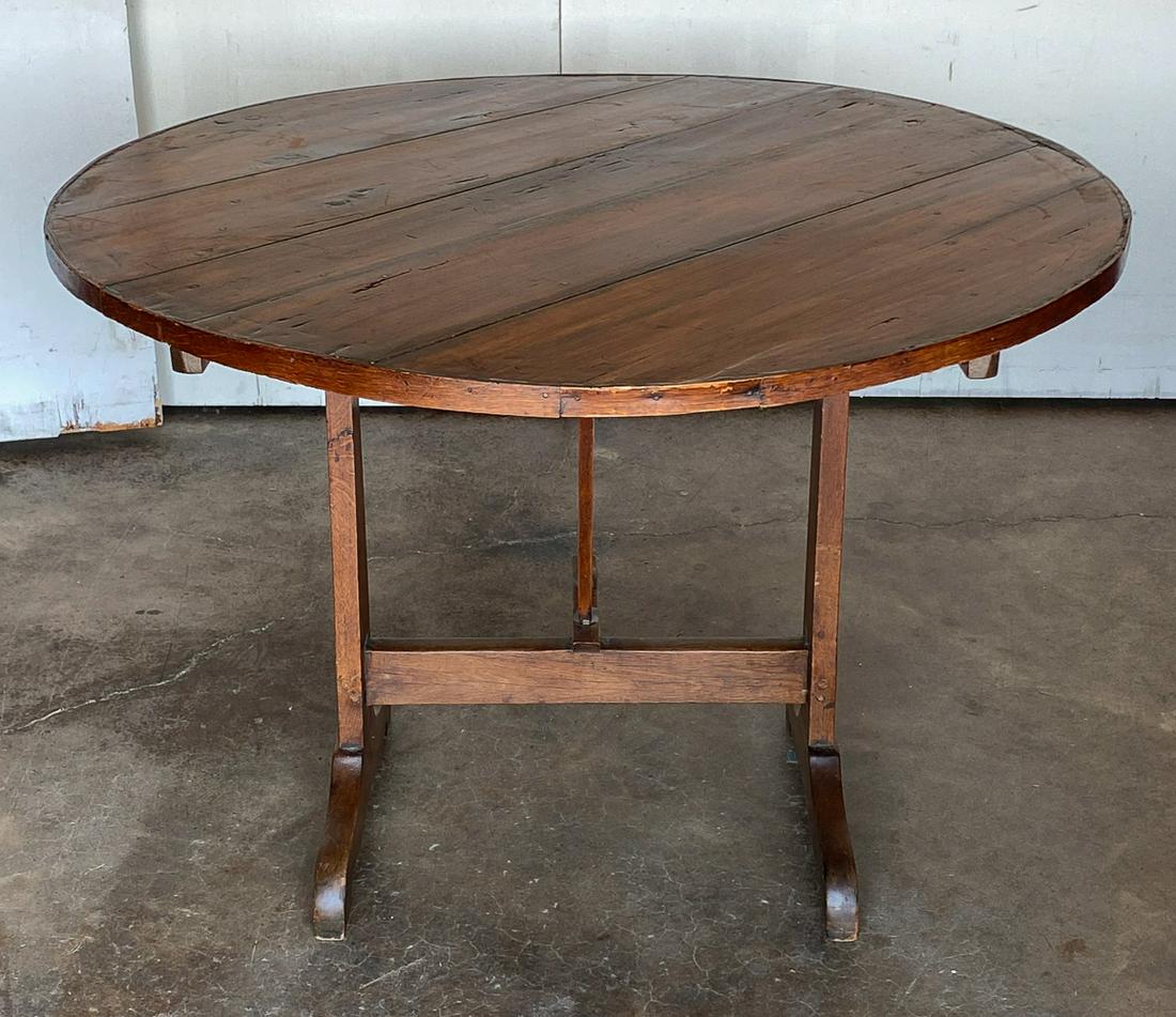 19th Century Wine Tasting Table: Tilt top has been secured and will need to be unscrewed to tilt. old repairs to edge. 40 1/2 w x 28 1/4 high.