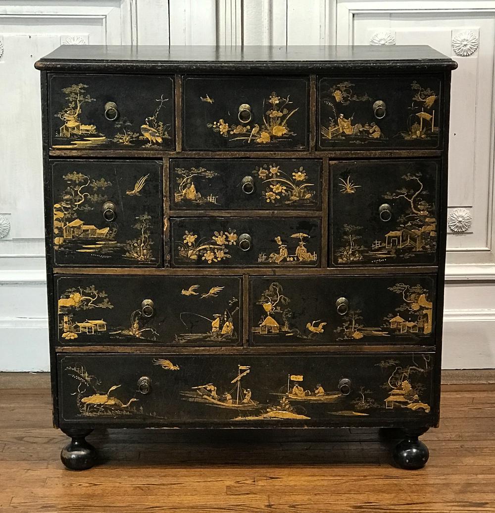 George III Japanned Chest Of Drawers: 19th Century, English, Black With Gilt Chinoiserie Overall, Rectangular Case With Configuration Of Nine Short Over One Long Drawer, Bun Feet, Height 38.5 Width 37 Depth 16.25 Inches. See Photos And Ma