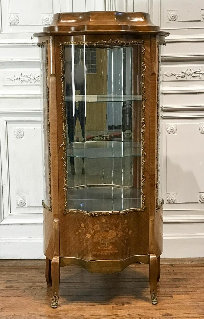 Louis XV Style Marquetry Vitrine: 20th Century, Stepped Cornice, Serpentine Case With Conforming Glazed Doors With Gilt Bronze Moldings, Cabriole Legs, Sabots, Height 67, Width 29, Depth 17 Inches, Electrification Present But Function
