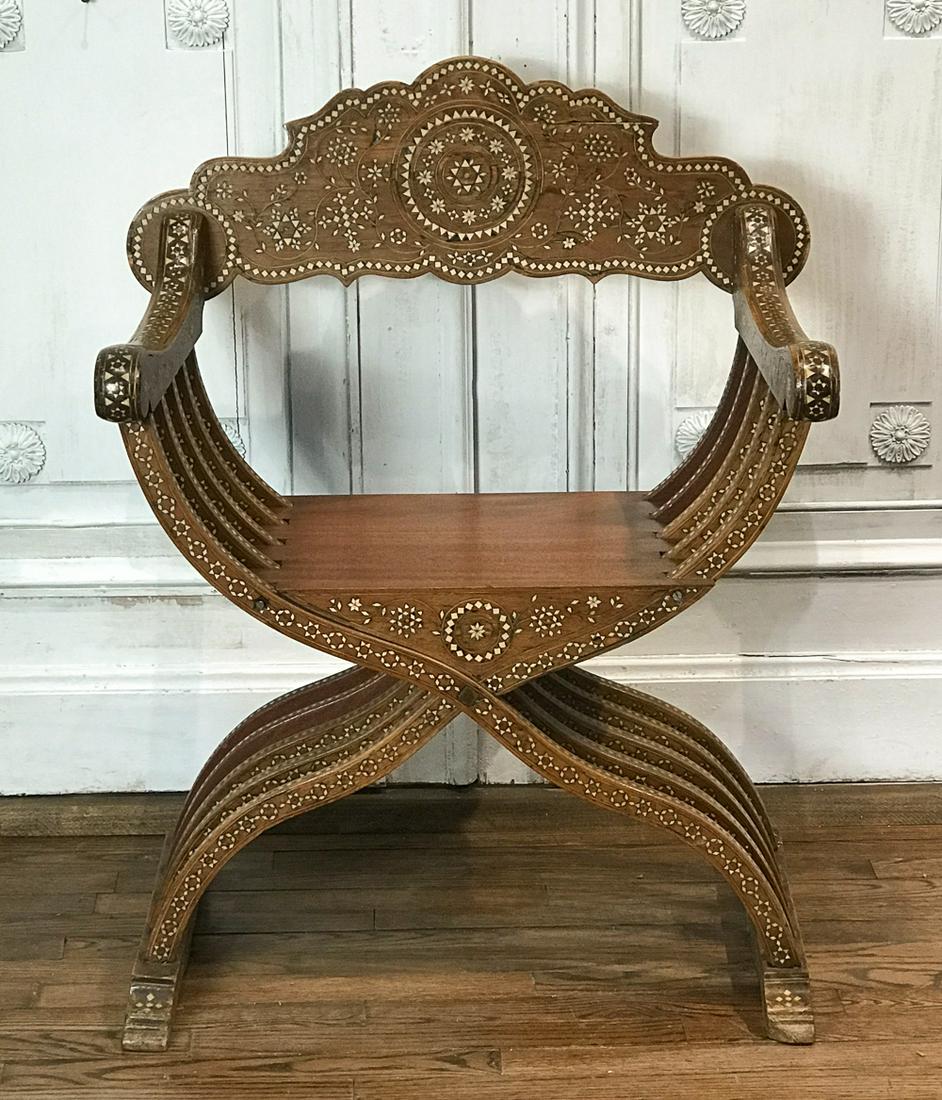 Italian Bone Inlaid Walnut Savonarola Chair: 19th Century, In The Moorish Taste, Shaped Crest, Scroll Arms, Plank Seat, Curule Supports, Trestle Base, Height 36, Width 28, Depth 20 Inches, Shrinkage Fissure To Crest, Later Seat. See Photos For A