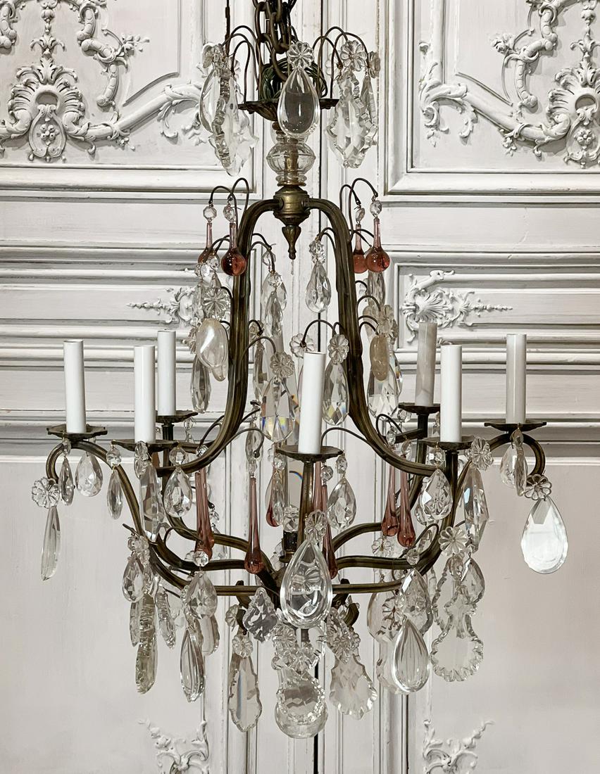 Italian Gilt Bronze And Glass Chandelier: 20th Century, In The Rococo Taste, Eight Lights, Cage Form Hung With Clear Shield And Faceted Crystals With Amethyst Glass Drops, Electrification Present But Function Not Guaranteed, Height 27 Diamete