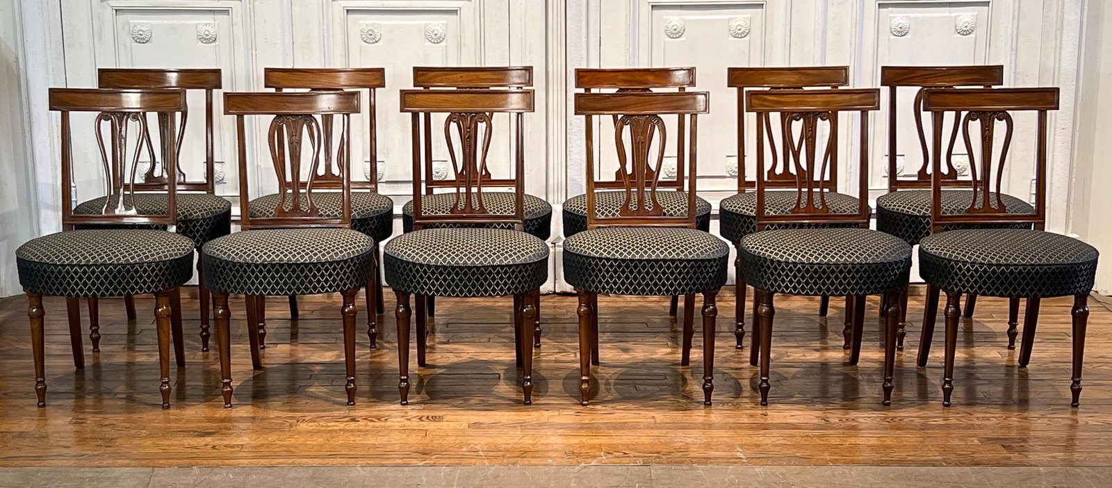 Twelve Louis Philippe Mahogany Dining Chairs: French, Mid 19th Century, Each With Tablet Crest, Harp Splat, Balloon Seat With Custom Black And Gold Upholstery, Turned Front Legs. Height 33.5, Width 19, Depth 17 Inches, Seat Height 18in. All Struc