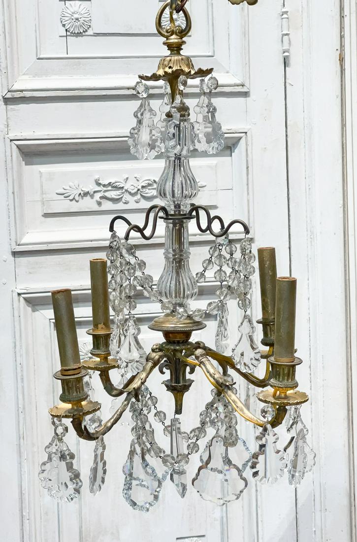 Small Baccarat Style Cut Glass Chandelier: French, 19th Century, Four Lights, Louis XV Taste. Gilt Bronze Acanthus Corona, Glass Sheathed Standard, Upswept Candle Arms With Foliate Candle Cups And Fluted Bobeches. Shield Prisms, Button Chains.
