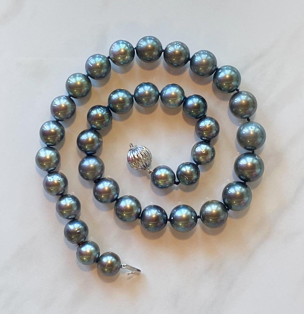 GIA Tahitian Pearl Necklace: 18.25 Inches Tahitian Pearl Strand, 11.11-13.83 Mm. 14k White Gold Clasp. Scroll Through Photos For GIA Certificate And Appraisal. All Jewelry In This Auction Must Be Paid By By Wire Transfer Or In-Pe