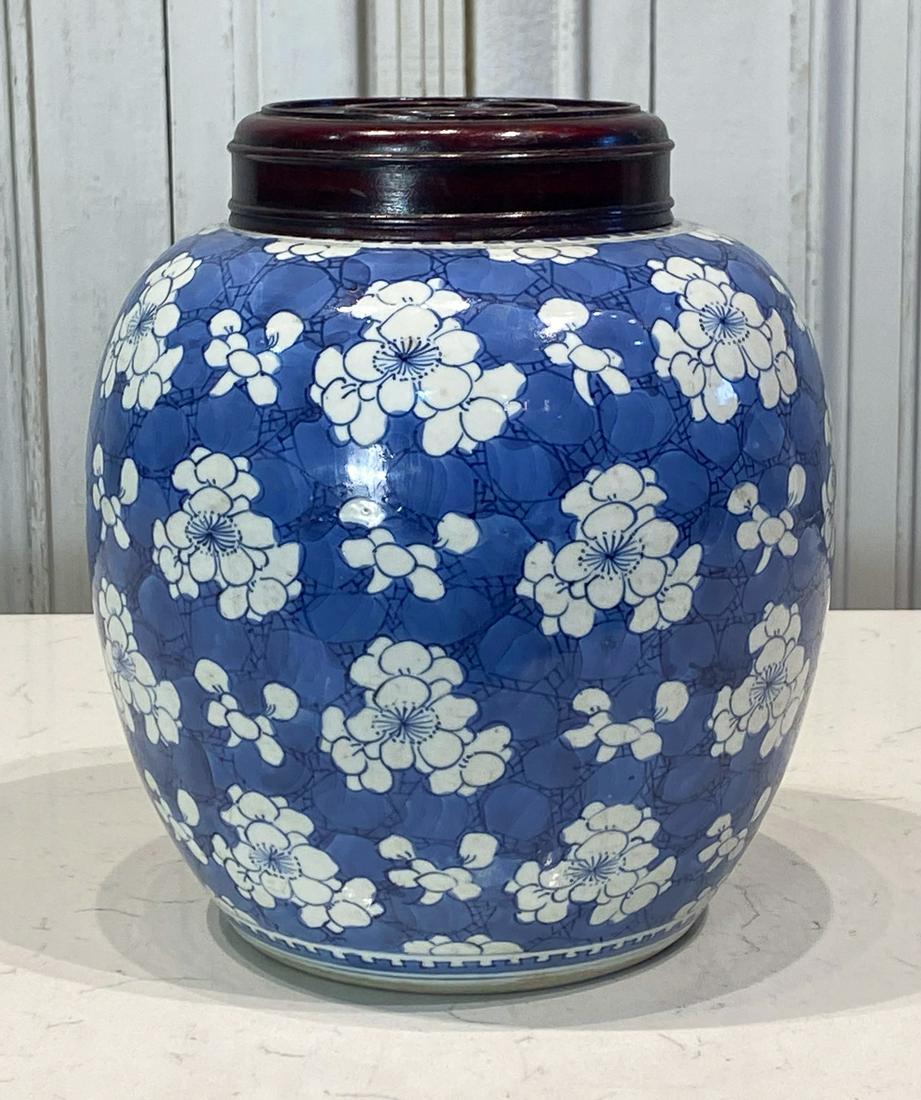Chinese Blue And White Porcelain Jar: Cherry Blossoms Throughout, Wood Cover, Height 9 Inches, Diameter 7.5 Inches, Firing Fissures Underside And Many Imperfections To Glaze Exposing White Clay Body Underneath, See Photos For Additional C