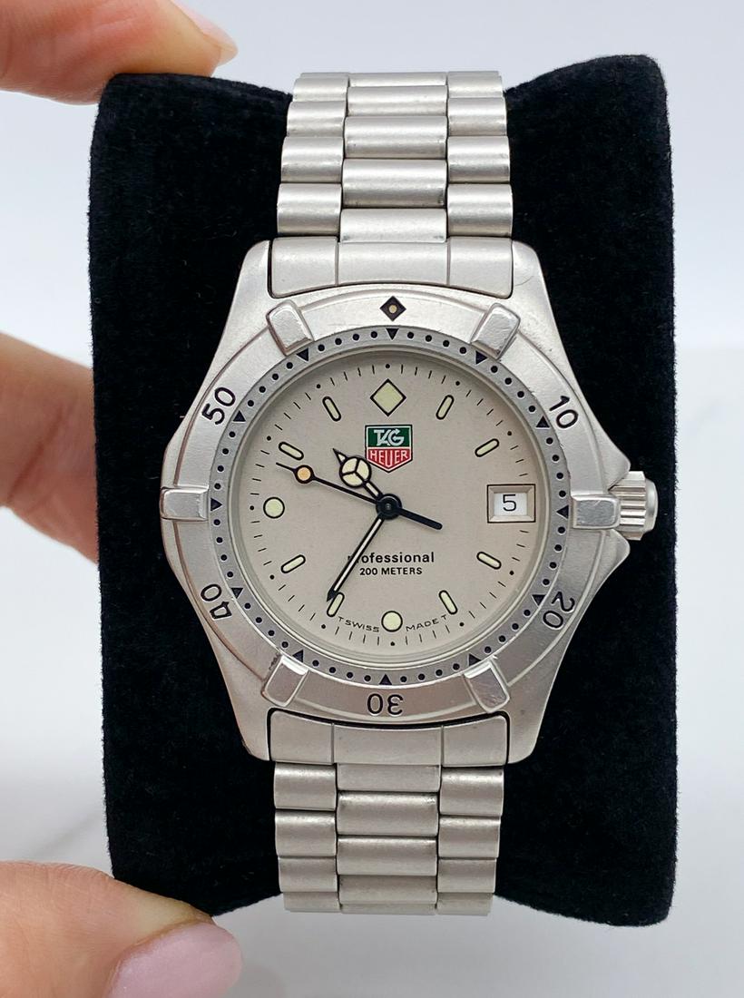 Tag Heuer Stainless Steel Watch: Stainless Steel, Sports BX. 37.2 Overall; Bezel 33.6. 6 1/4 Inches With Extra Links. Includes Original Box And Papers. Scroll Through All Photos To View Condition Commensurate With Age. Assume Servici