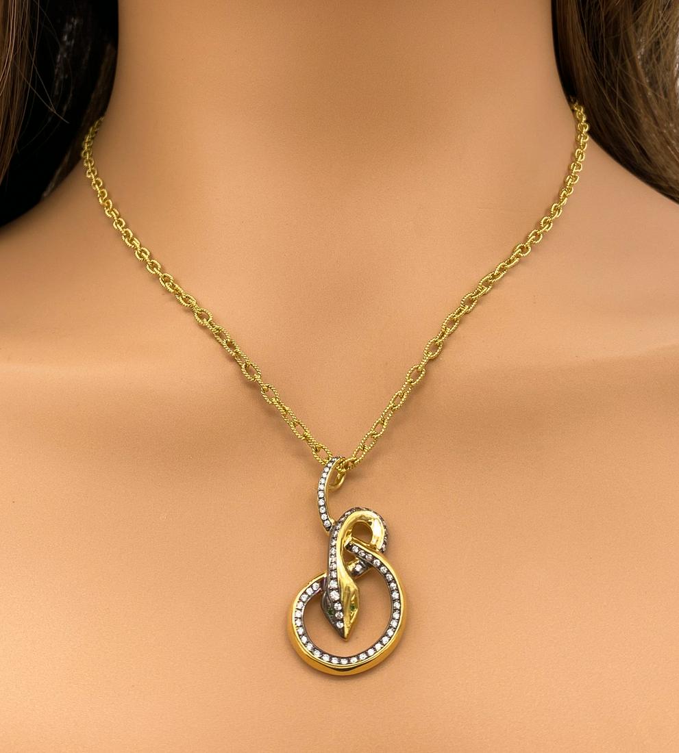 Diamond And Emerald Snake Pendant, 18k: 18k Yellow Gold Snake Pendant With Diamonds And Emerald Eyes. 16.3 Grams. 10 Inches Long; Pendant Is .75 Wide. See Photos For Additional Condition Information. Jewelry Must Be Paid By Wire Transfer Or